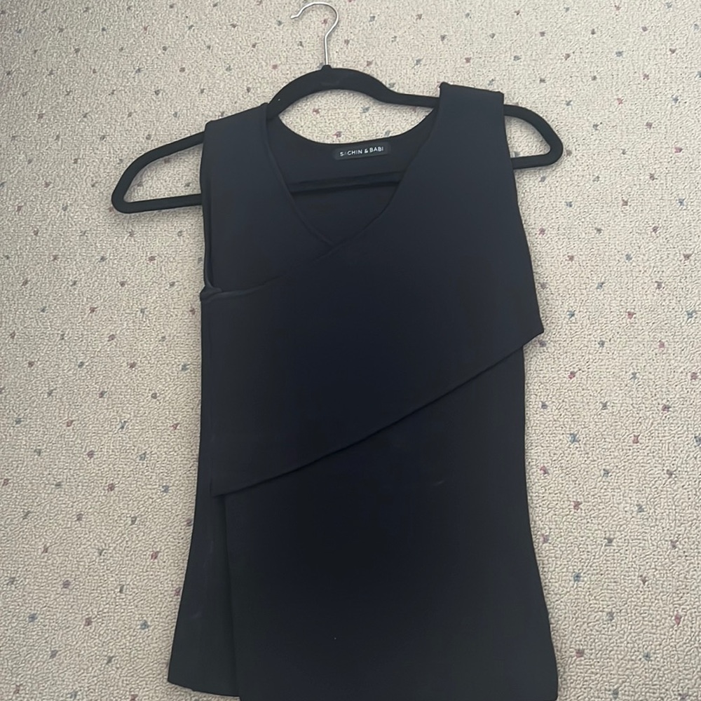 Sachin and Babi black top with front wrap detail.